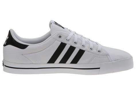 adidas white shoes with black stripes|black and white adidas cleats.